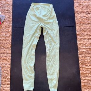 Light green, wunder train lululemon leggings.